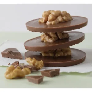 Monedas de chocolate de leche con nuez